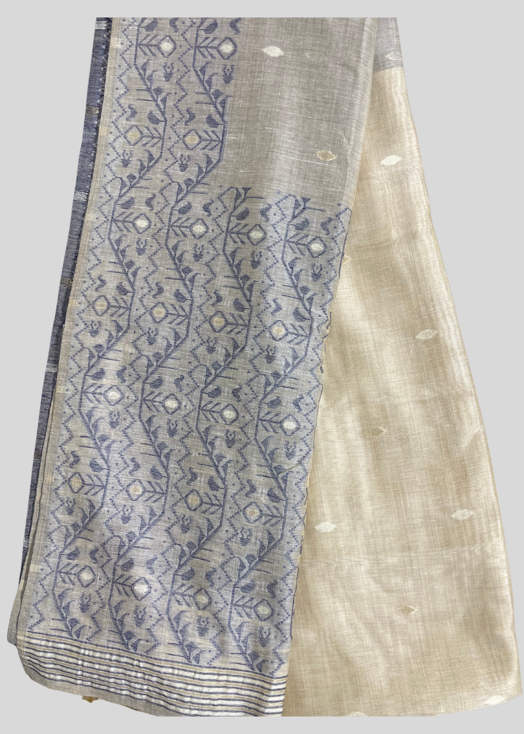 Off white and navy blue color soft muga cotton saree with jamdani woven design [SKU:S102942]