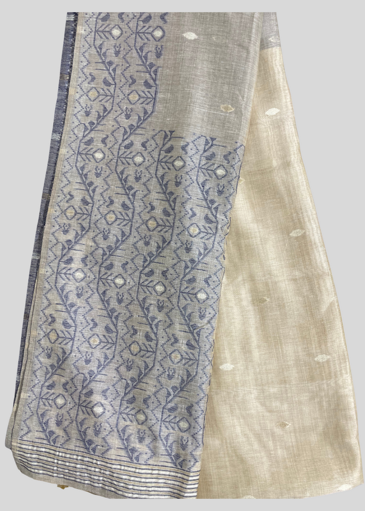 Off white and navy blue color soft muga cotton saree with jamdani woven design [SKU:S102942]