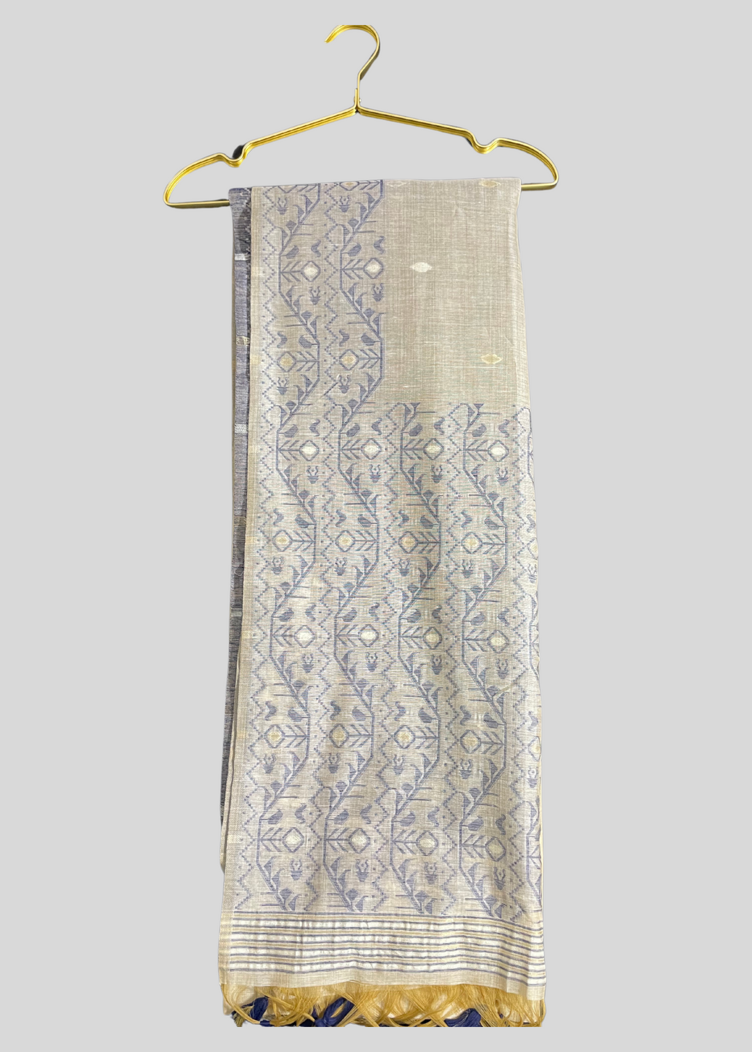 Off white and navy blue color soft muga cotton saree with jamdani woven design [SKU:S102942]